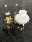 An Aladdin chrome oil lamp with glass chimney and shade, two Bells 4.