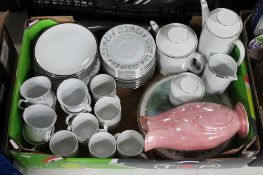A box containing a Maling pink lustre vase, Chinese wall plates, a Thomas tea service,