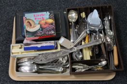 A tray containing a large quantity of boxed and unboxed tableware,