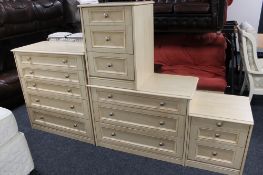 A contemporary six drawer chest in a pine finish,