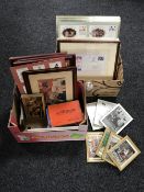 Two boxes containing framed first day covers, frame picture cards, small framed advertisements,