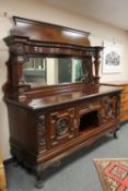 An impressive Victorian mahogany mirror backed sideboard on claw feet,