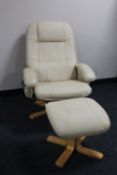 A cream leather swivel massage chair on a beech base,