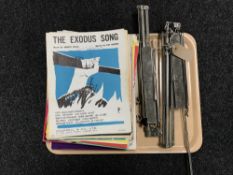 A tray containing assorted music books,