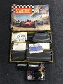 A boxed vintage Scalextric set with accessories