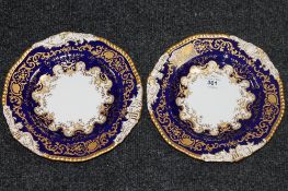 A pair of Coalport gilded cabinet plates,