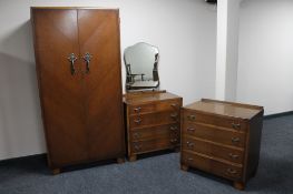 An early twentieth century three piece oak bedroom suite