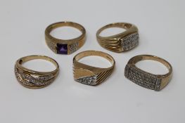 Five 9ct gold diamond set rings, 24.1g.