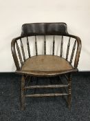 A twentieth century saloon armchair