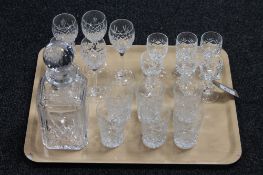 A tray containing a lead crystal whiskey decanter and assorted lead crystal drinking glasses (18)