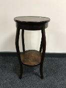 An inlaid mahogany two tier plant stand