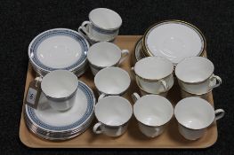 A tray containing eighteen pieces of Royal Doulton Grey Friars tea china,