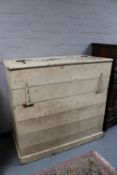 An antique pine feed bin