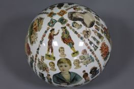 A Victorian glass 'Decalomania' witches ball