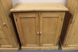 A reclaimed pine double door cupboard,