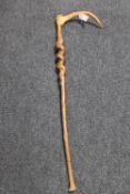 A walking stick with antler handle