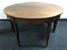 A pair of antique mahogany D end tables