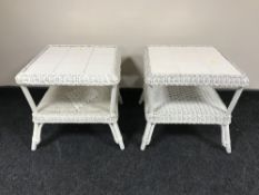 A pair of painted wicker two tier tile topped tables