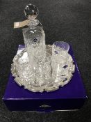 A boxed Edinburgh Crystal International Whiskey Decanter with four whiskey tumblers,