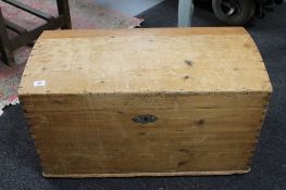 An antique pine domed trunk