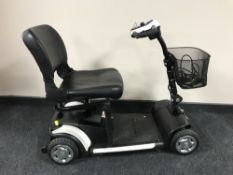 A Roma disability cart with keys and charger