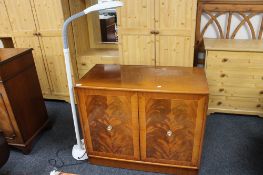 An inlaid mahogany double door audio cabinet,