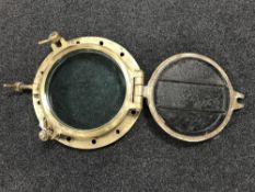 A 20th century brass ship's porthole