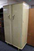 A mid twentieth century double door wardrobe