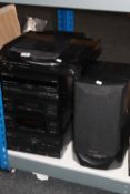A Technics five piece stack system with remote and speakers