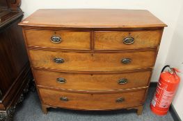 A nineteenth century mahogany bow fronted five drawer chest on bracket feet,