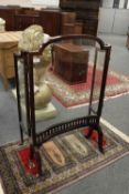 A nineteenth century glazed three way folding screen