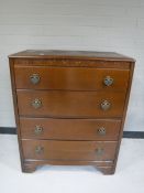 A mid twentieth century four drawer chest