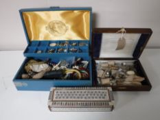 A tray containing jewellery boxes, costume jewellery, an eastern inlaid box, hat pins,