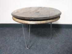 A whiskey barrel topped coffee table