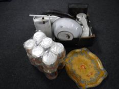 A box of kitchenalia, enamelled tins, mesh food covers,