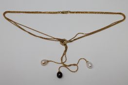 An 18ct gold pearl necklace, 16.