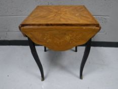 A flap sided occasional table