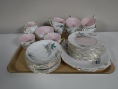A tray containing a thirty four piece Queen Anne Louise part tea service