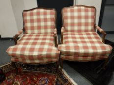 A pair of antique style open armchairs,