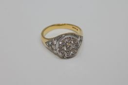 A superb quality 18ct gold diamond set signet ring, the centre stone weighing approximately 0.