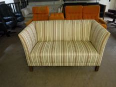 A two seater settee upholstered in a striped fabric CONDITION REPORT: Approximately