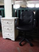 A swivel office armchair,