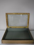 A glazed pine counter top display cabinet