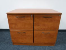 A four drawer filing chest with key