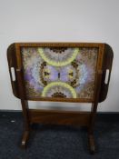 An inlaid butterfly tray on stand
