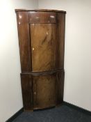 A late nineteenth century mahogany double corner cabinet