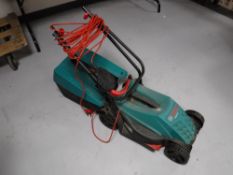 A Bosch Rotak electric lawnmower with grass box