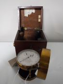 A boxed brass air meter, by T.