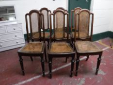 A set of six mahogany bergere dining chairs