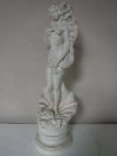 A plaster figure,